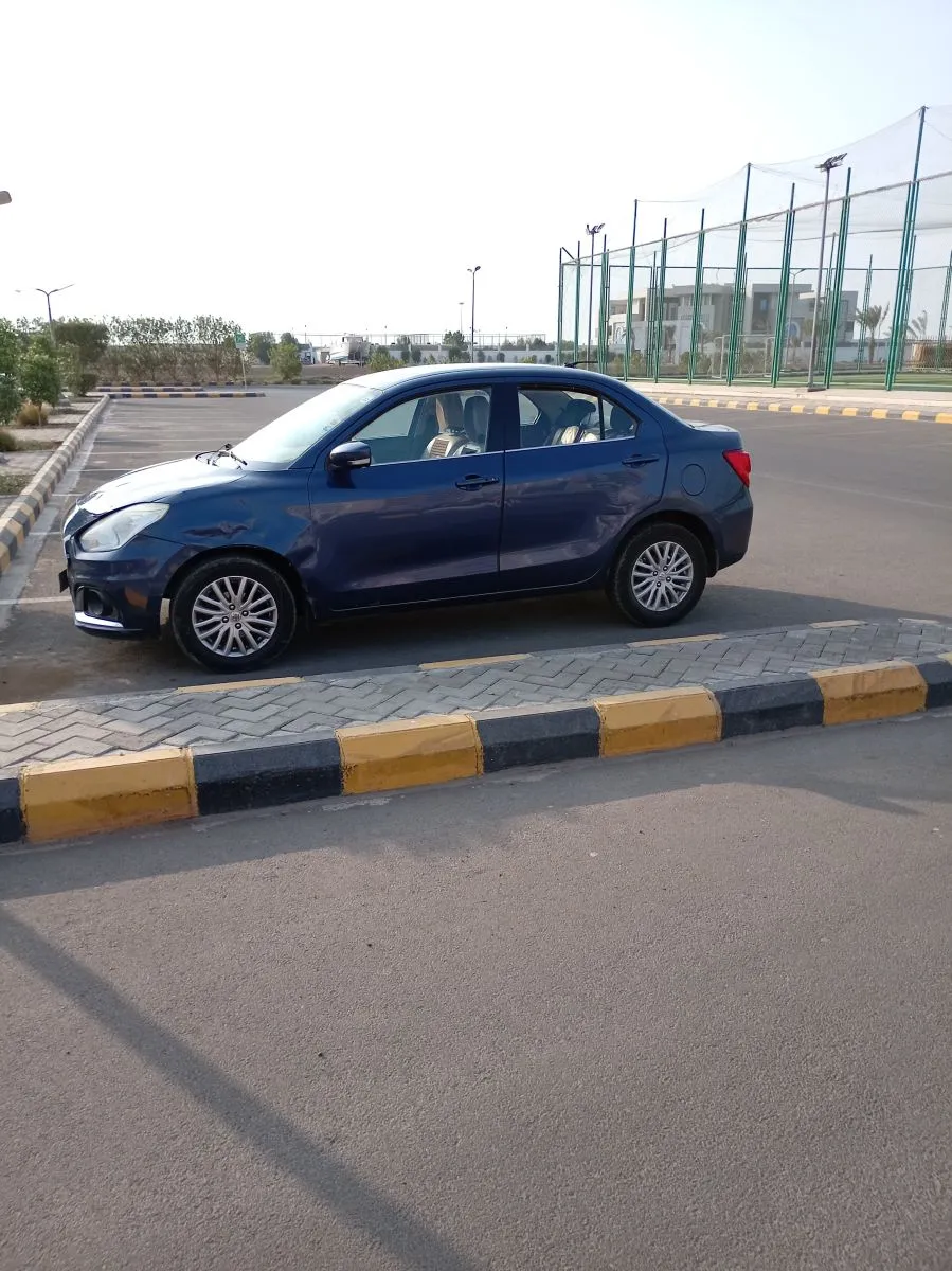Suzuki Dzire 2021, bon état, climatisation, économique à Djibouti listing photo